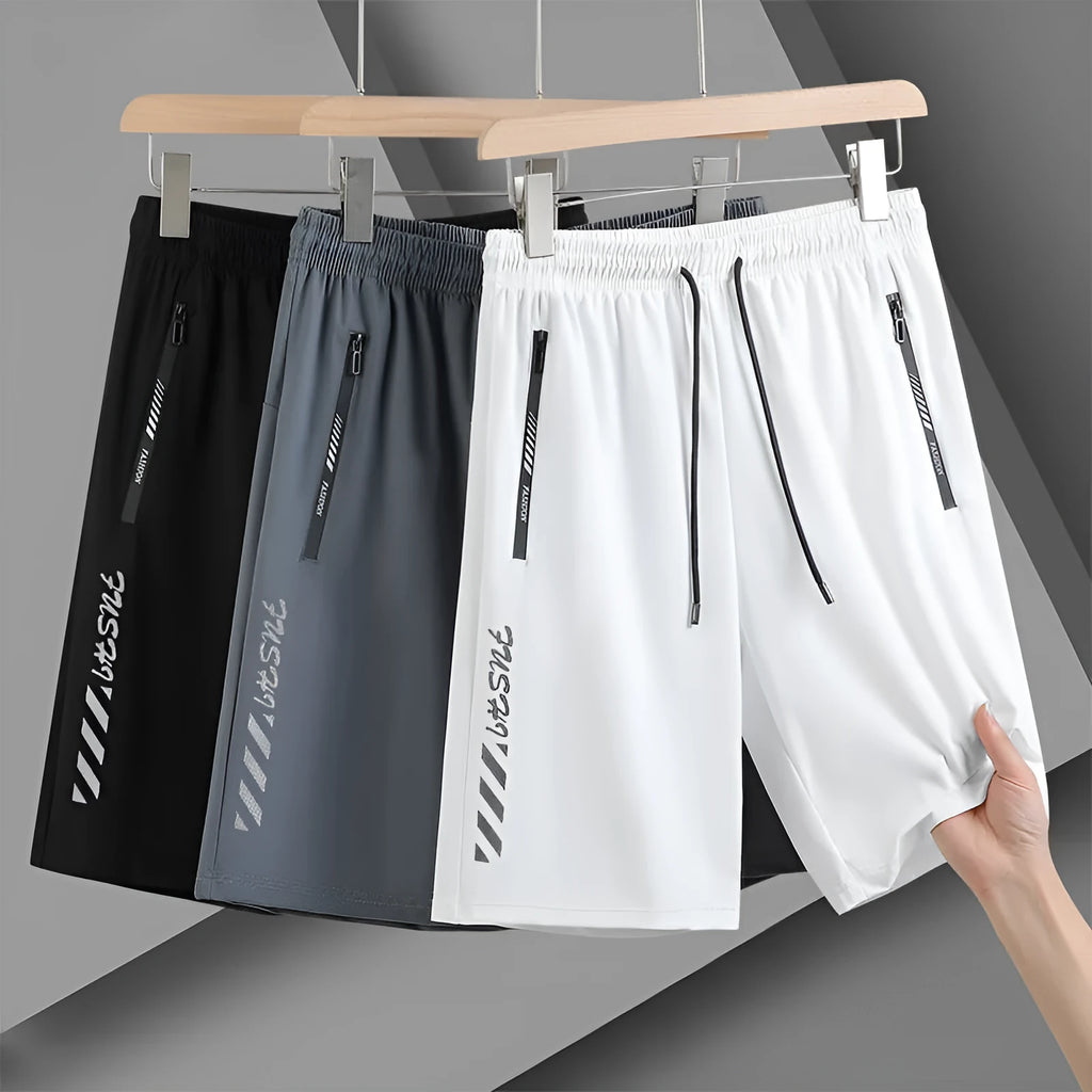 Men's black quick-drying nylon sports shorts with loose fit and elastic waistband
