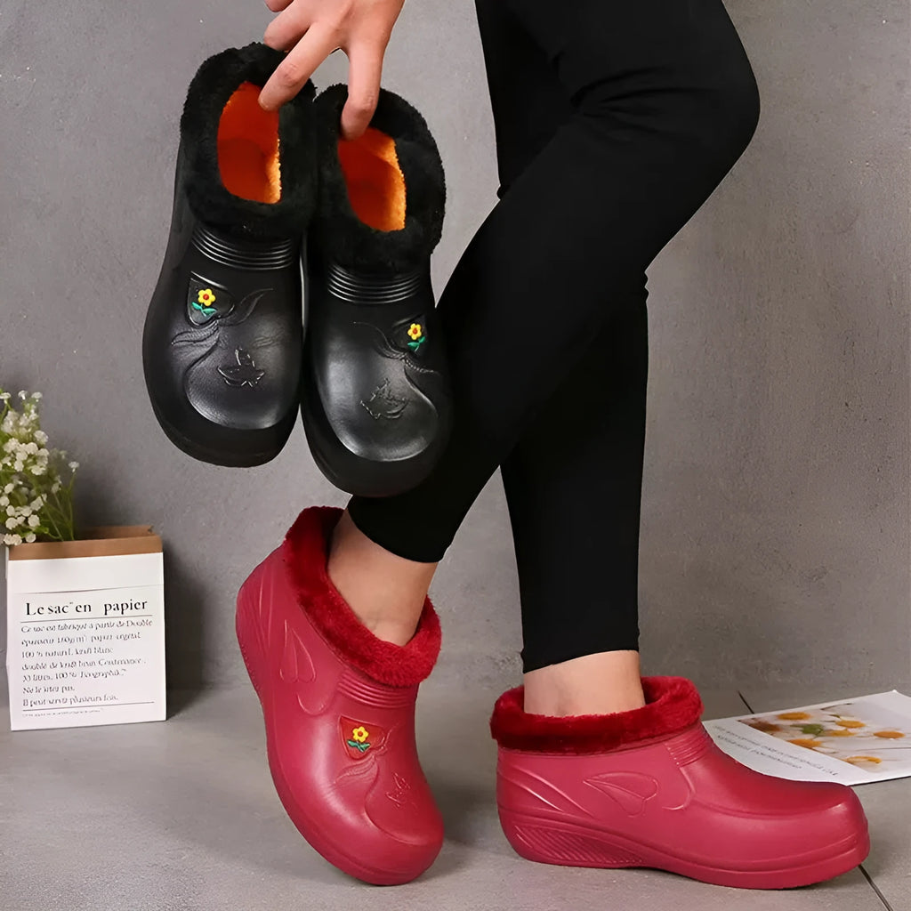 Unisex waterproof fleece-lined rain boots with anti-slip EVA sole in black, side view