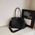 PU leather tote bag with a horizontal square shape and double shoulder straps in a neutral colour