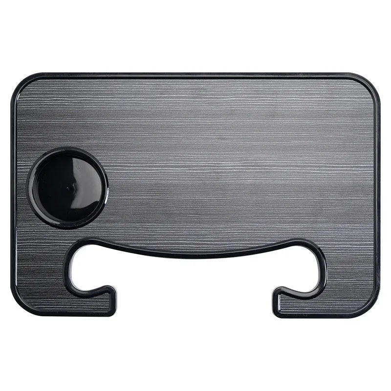Black car steering wheel laptop tray with foldable cup holder on a 42cm by 28cm surface.