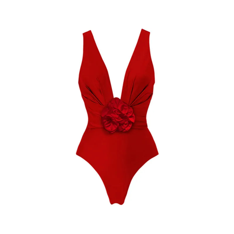 Red women's V-neck one-piece swimsuit with detachable flower and matching skirt on a mannequin