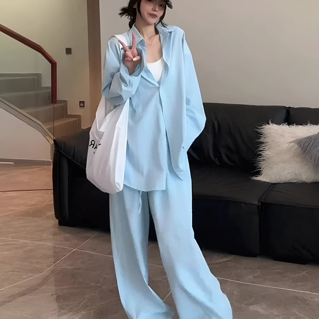 Women's blue shirt and wide-leg pants suit with flight sleeve and button stitching details
