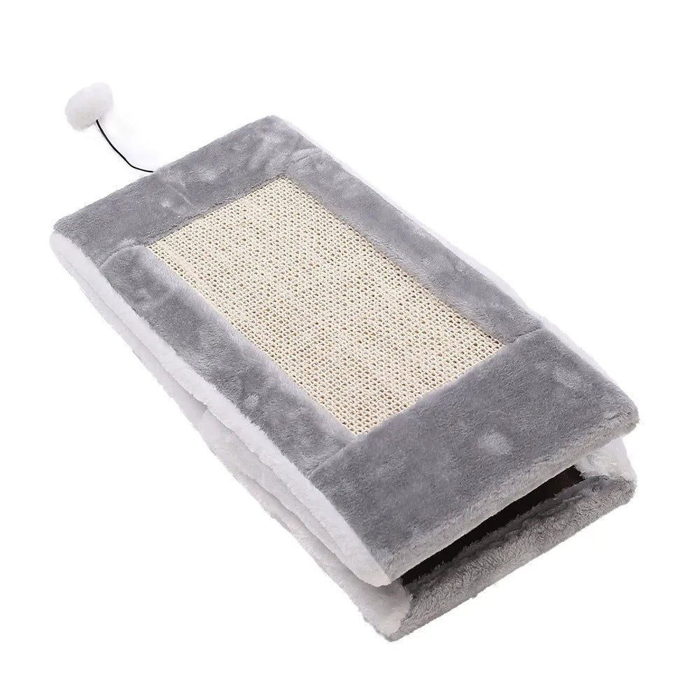 Triangle-shaped cat scratching post with integrated plush fur cat bed in grey and white colour scheme