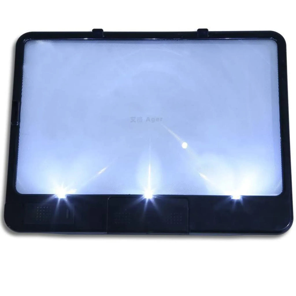 Black handheld 3x magnifying glass with built-in white LED light on a PVC handle.