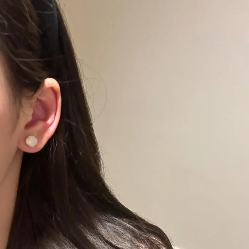 Round egg surface chalcedony earrings with four-claw setting in Chinese national fashion retro style