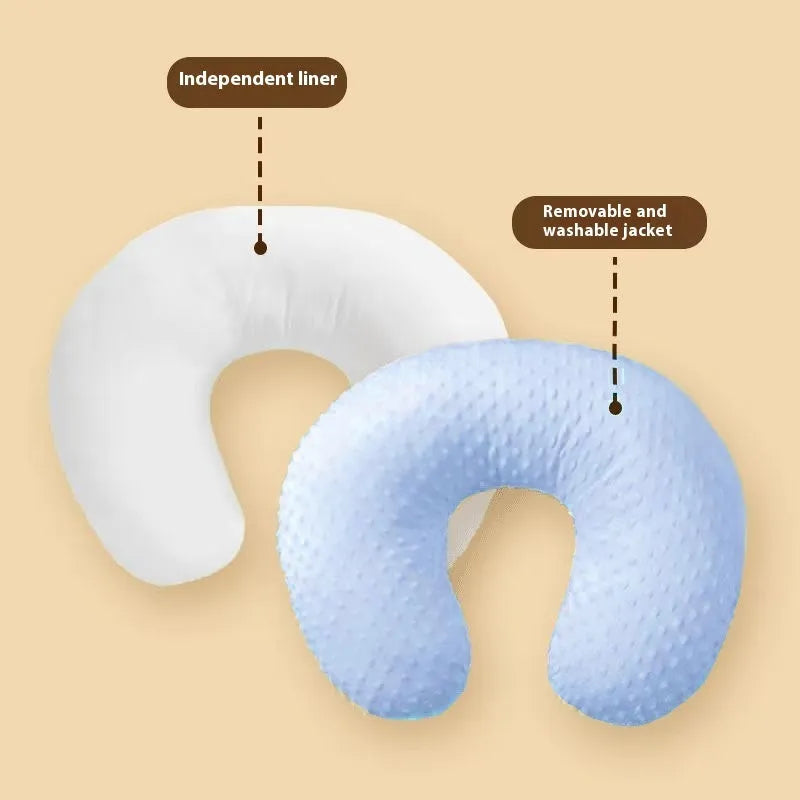 M shaped nursing pillow with removable pillowcase for breastfeeding support and spill prevention