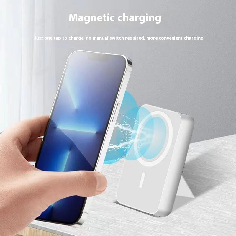 Folding bracket magnetic suction power bank in white with 10000mAh capacity and compact plastic shell
