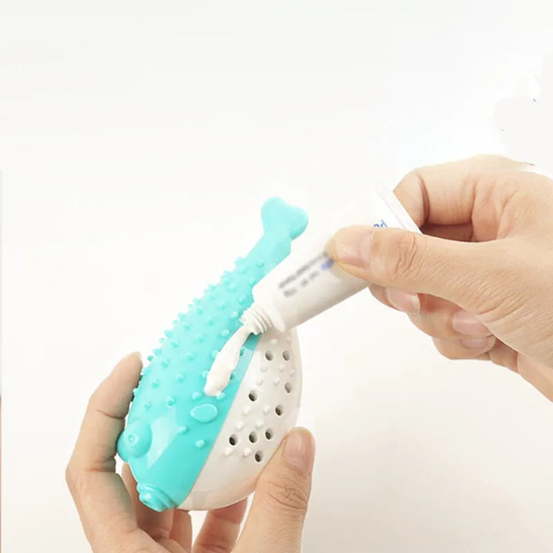 Blue silicone fish-shaped chew and grab toy for cats on a white background.