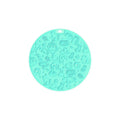 Round silicone pet lick mat with suction base in blue colour on tiled surface