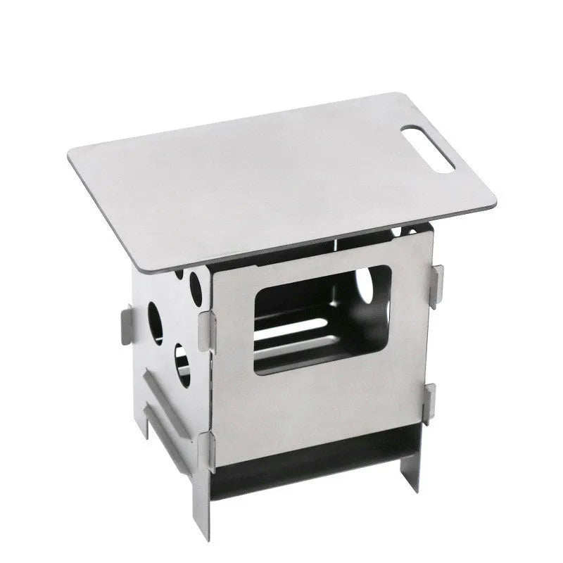 Grey pure titanium alloy multi-fuel camping stove with one-piece construction outdoors