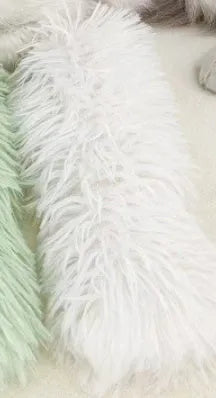 Green, white, blue, and pink plush cat toy pillow measuring 27cm by 10cm