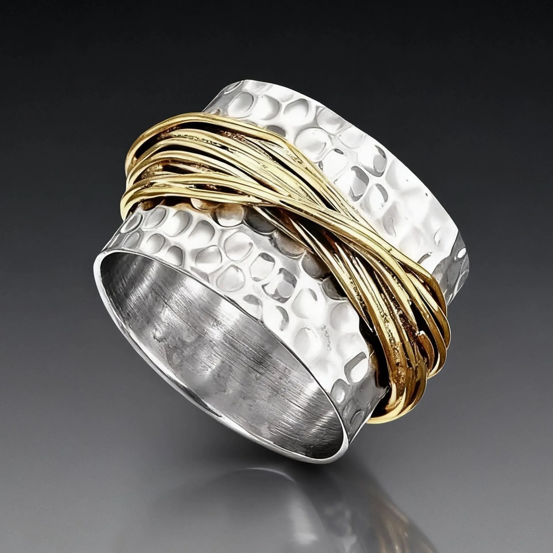 Alloy hammered metal coil ring with electroplated two-tone finish available in sizes 6 to 10