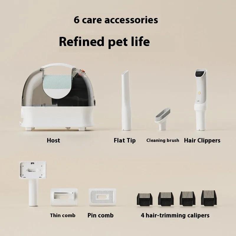 Pink and white pet grooming vacuum cleaner with shaver attachment and accessories