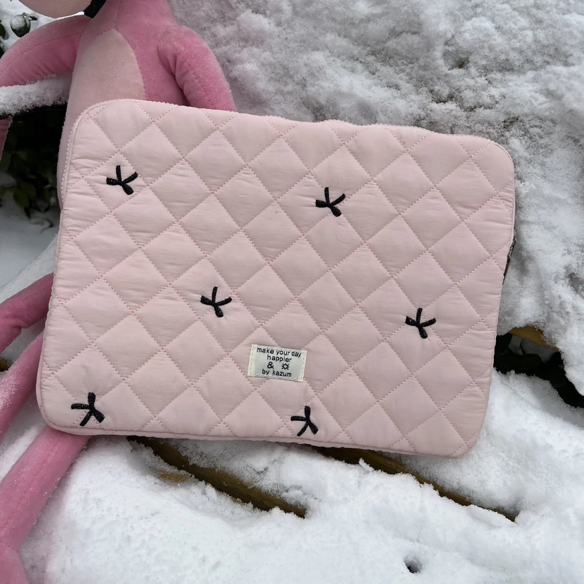 Rhombus embroidered bow design on nylon laptop storage bag showing colour and size options