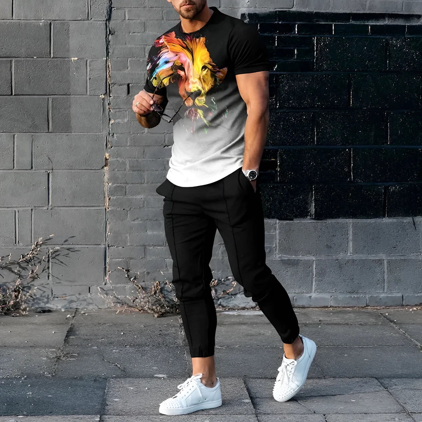 Men's lightweight polyester sports tracksuit set with short sleeve top and trousers on a mannequin.