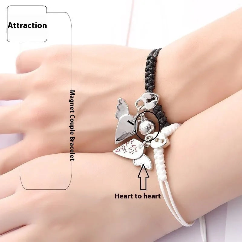 Alloy magnetic suction bracelet pair for couples with symbolic design options