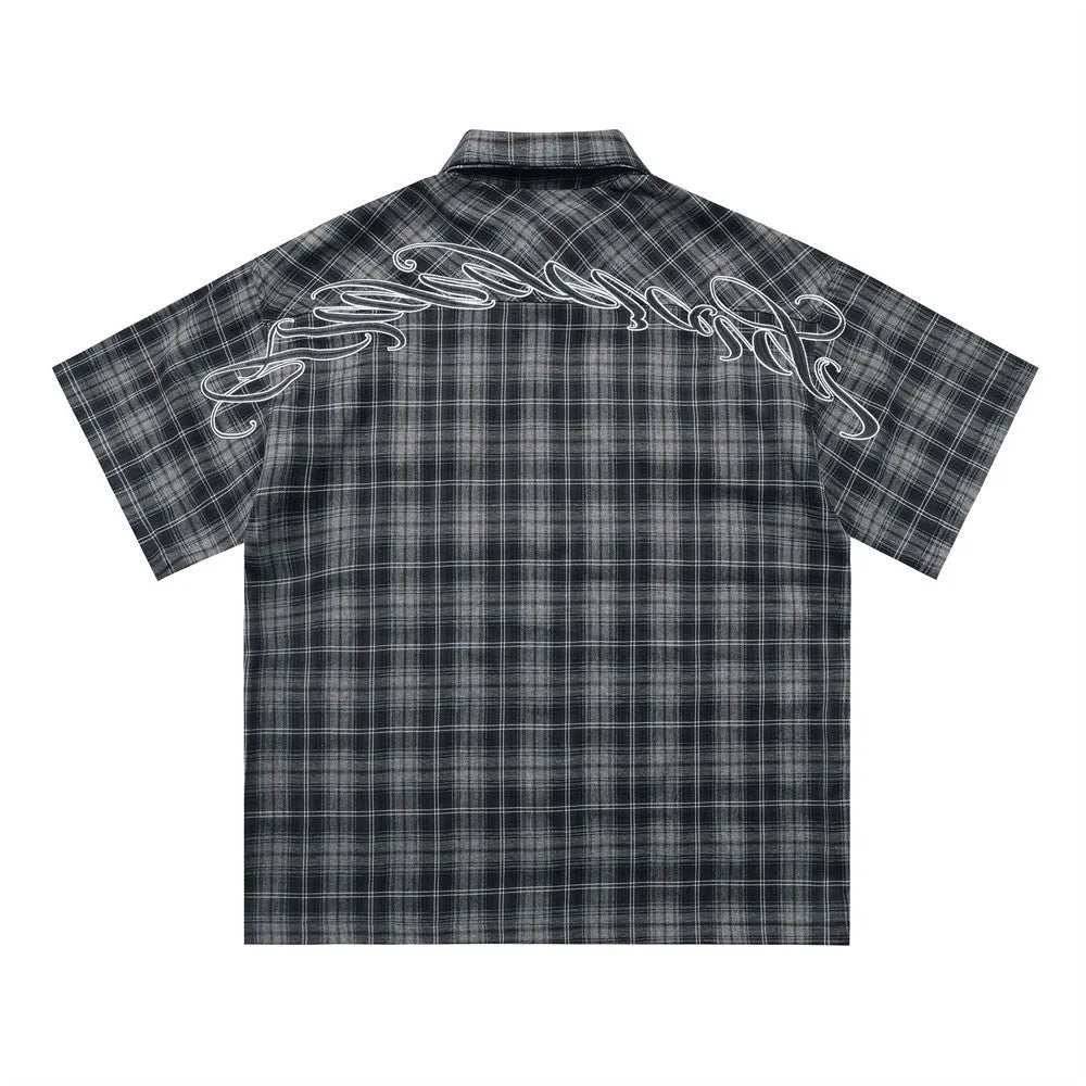 Men's black and brown plaid short-sleeve shirt with letter embroidery detail