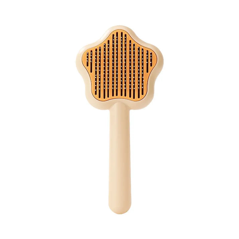 Self-cleaning stainless steel needle cat comb with magic wand handle in green or yellow