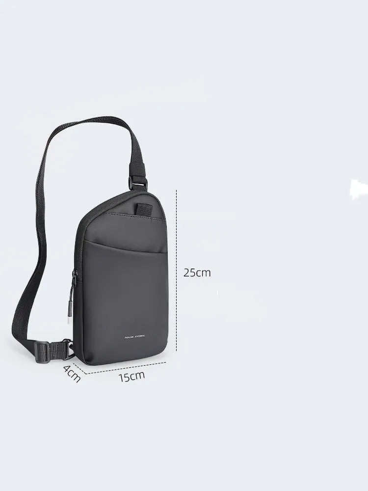 Men's black Oxford cloth crossbody bag showing reinforced sewing thread detail
