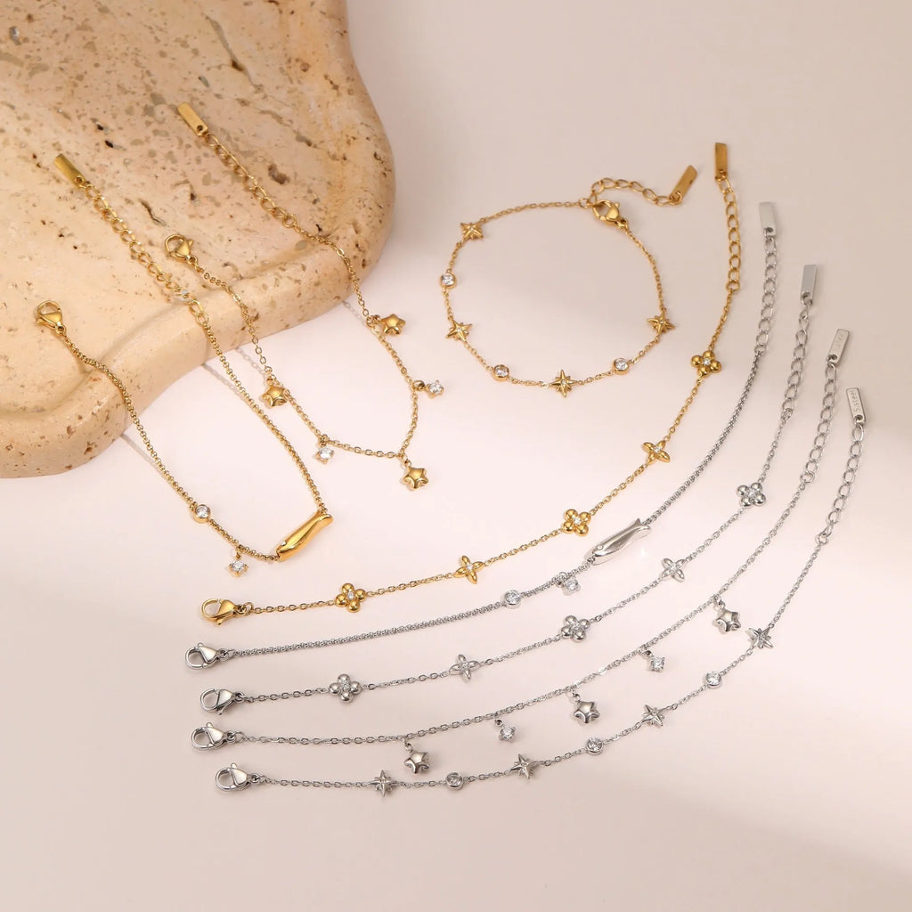 Women's stainless steel bracelet with 18K gold plating and geometric star pendant