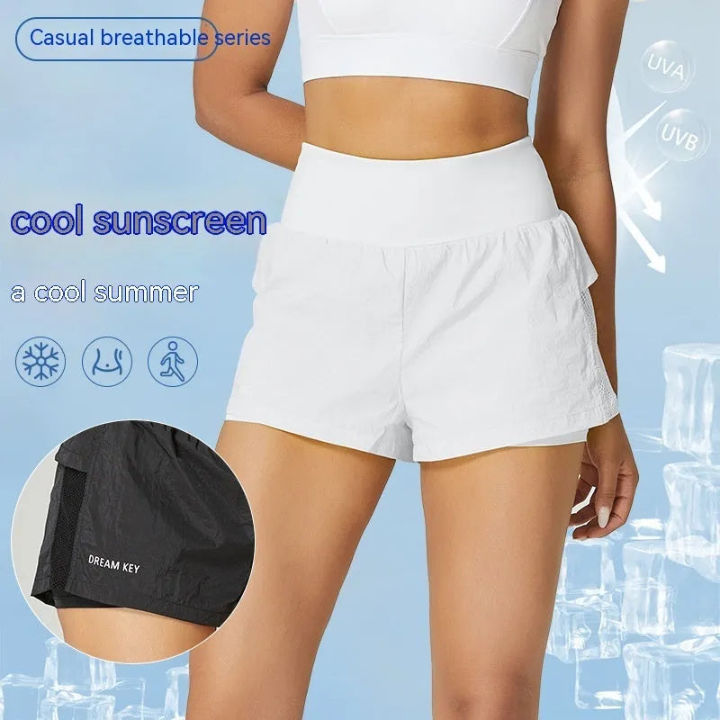 Women's loose casual quick-drying sports shorts in a cotton blend fabric on a hanger.