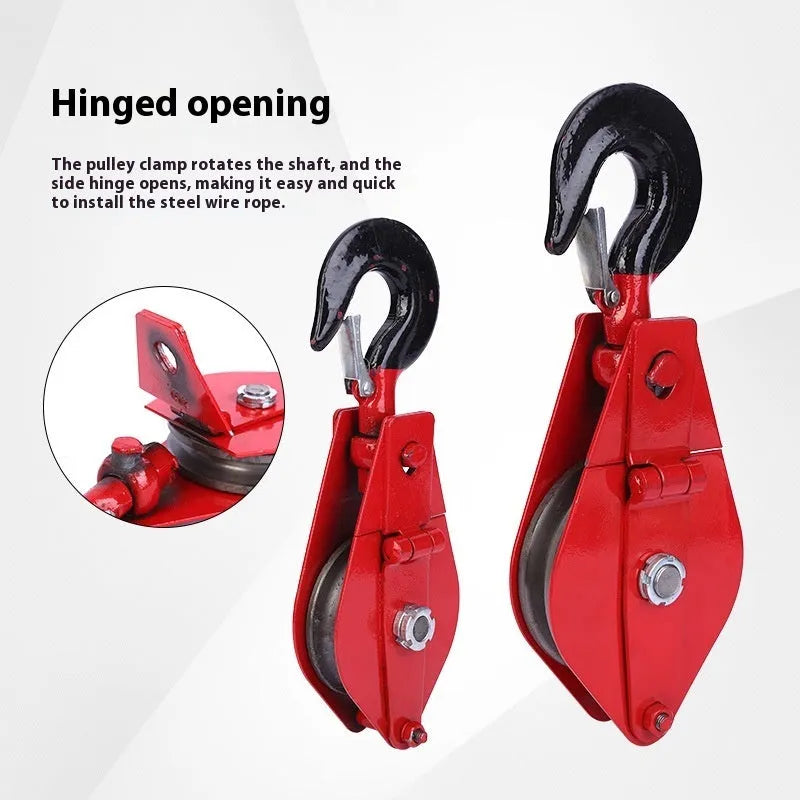 Red industrial single sheave lifting pulley with a forged steel hook and safety latch.