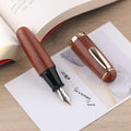 Short chubby solid wood ink pen with fine tip in Ebony Rosewood finish, gift box packaging