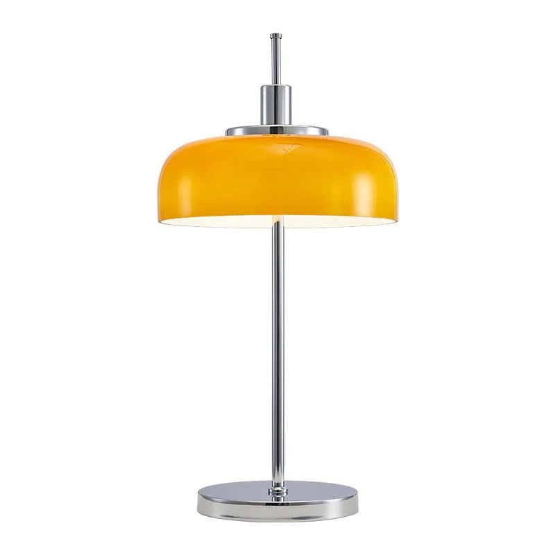 Retro table lamp with glass lampshade and chrome finish on a wooden surface