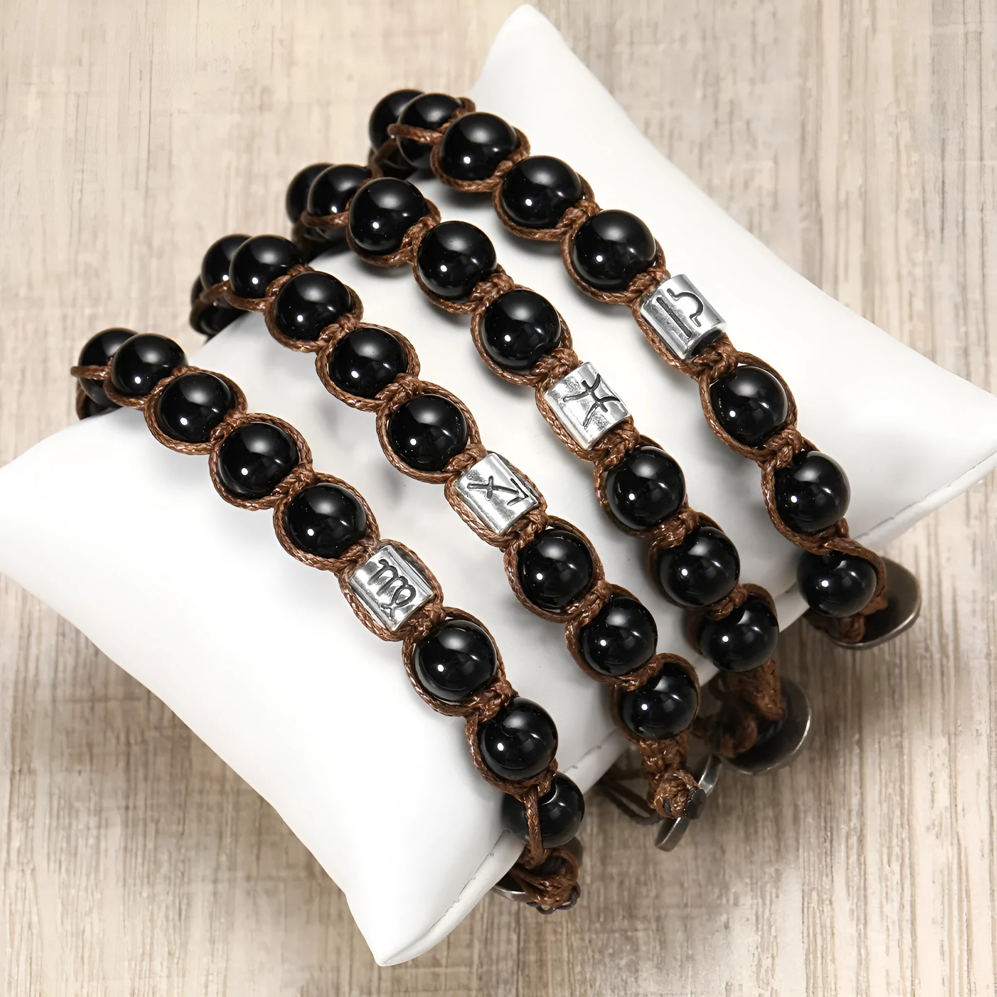 Natural obsidian hand-woven zodiac bracelet with stainless steel accent, unisex design