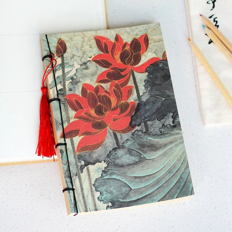 A5 antique thread-bound notebook with embossed cover and decorative tassels