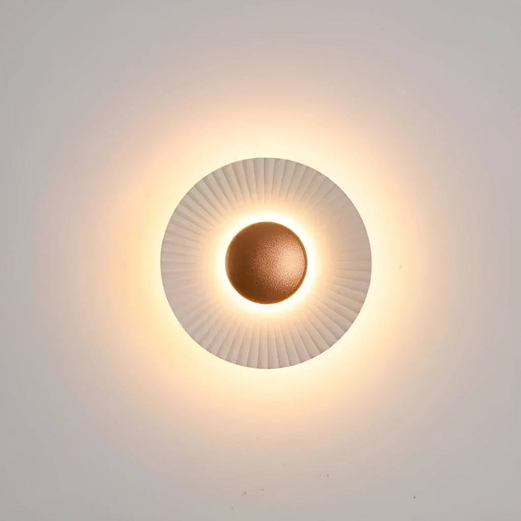 Round aluminium LED wall lamp in a choice of six colour finishes for bedroom or living room.