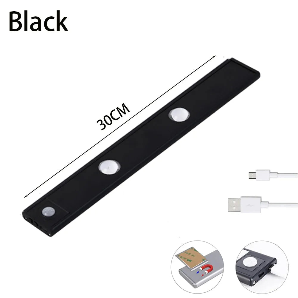 Silver ultra-thin LED light strip with motion sensor mounted inside a wooden wardrobe.