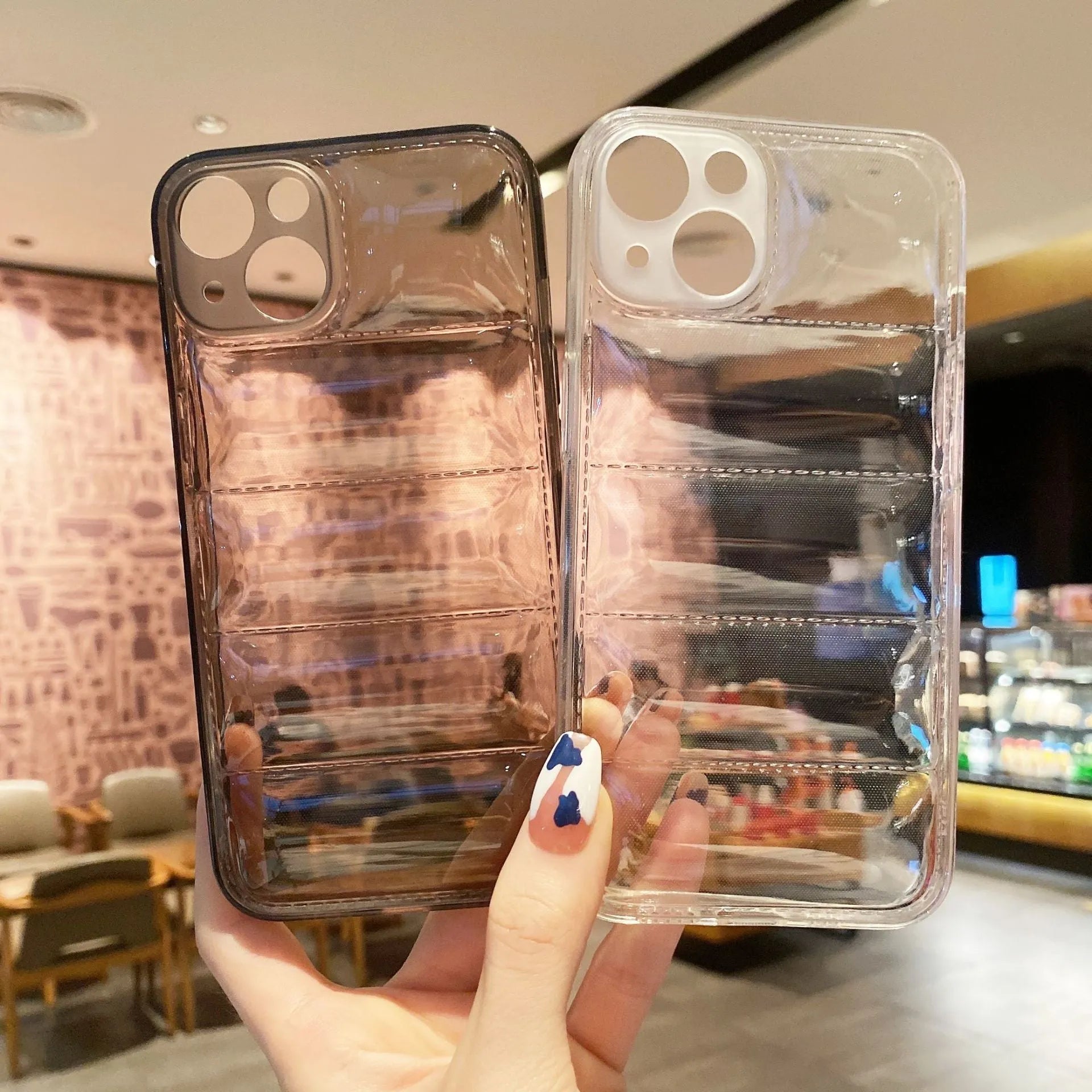 Transparent black TPU phone case with air cushion edges and down jacket pattern for iPhone 15 Pro Max