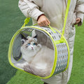 Large transparent EVA hard-shell cat backpack in grass green, showing space capsule design for pets up to 9kg.
