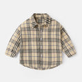 Boy's khaki lattice print cotton long sleeve casual shirt on a hanger
