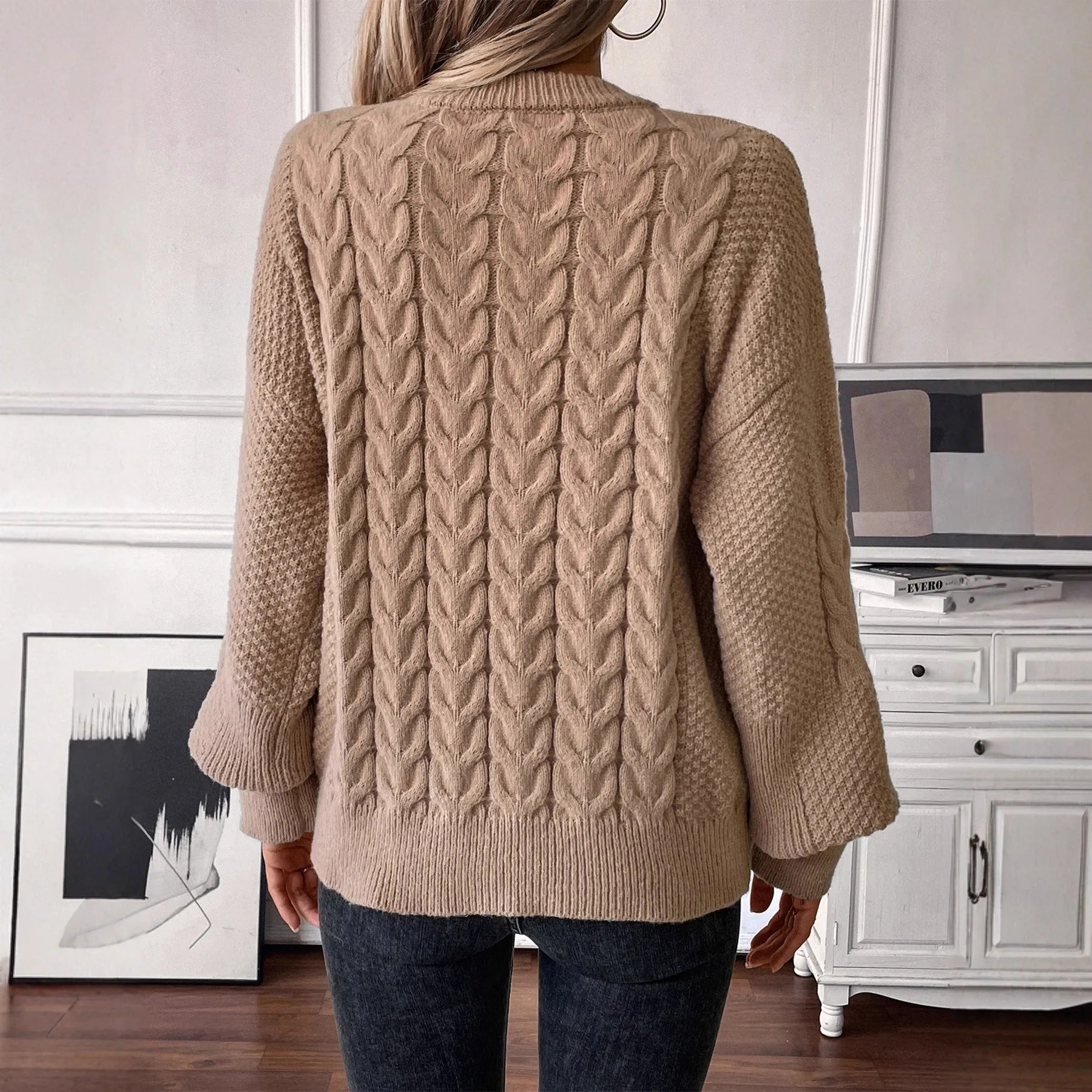 Women's loose casual pullover sweater with twist design in beige colour
