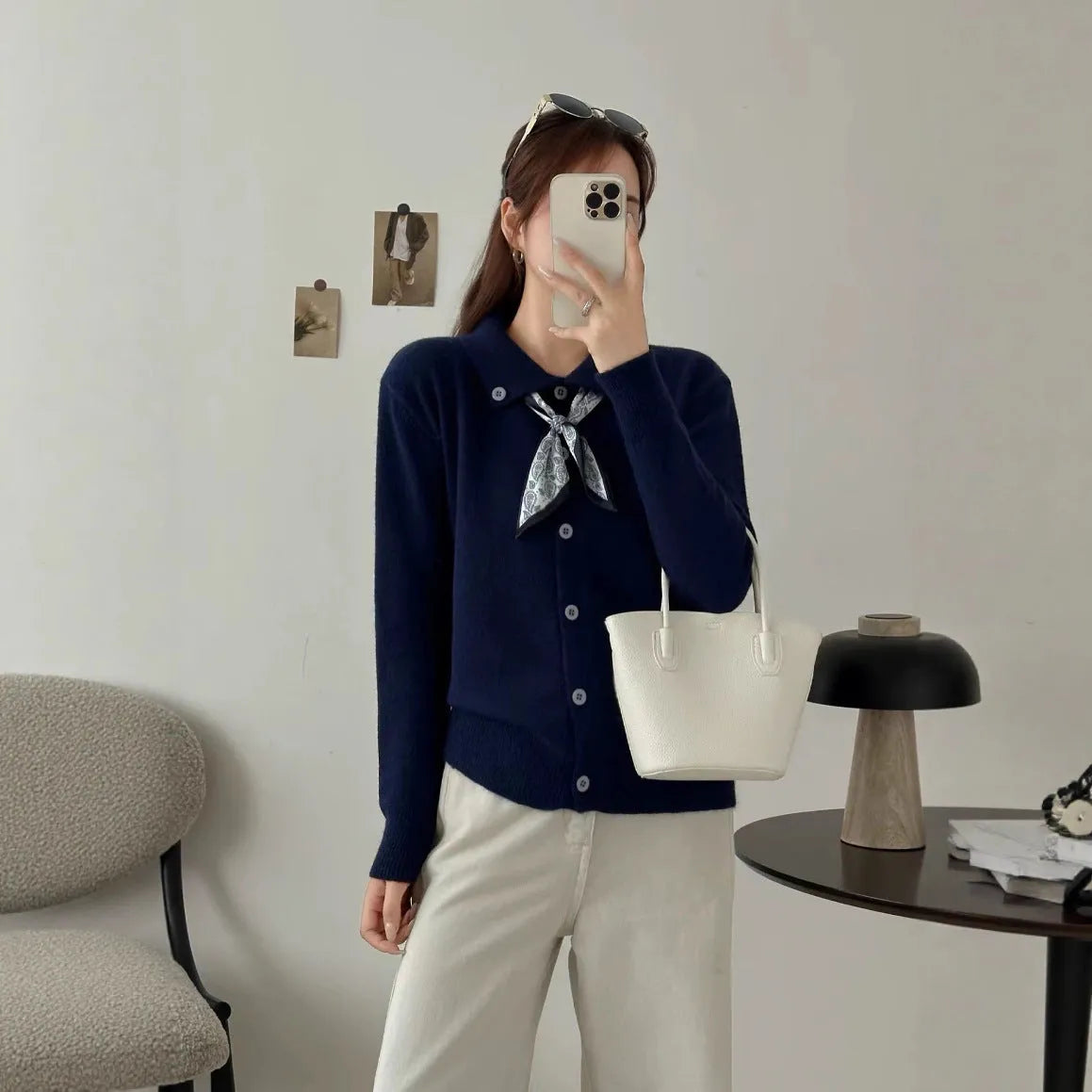 Beige lapel scarf collar cardigan sweater with long sleeves on a hanger