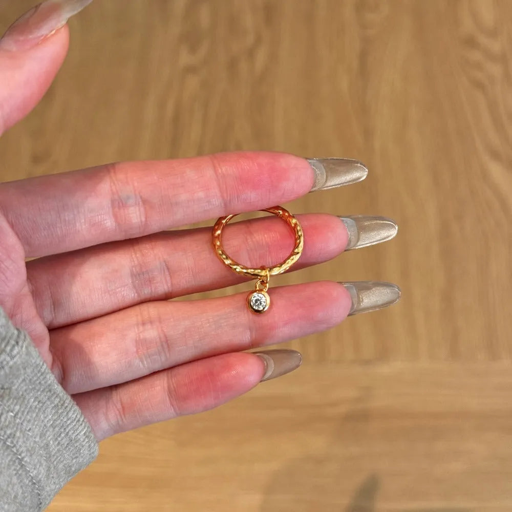 Women's silver ring with pleated texture in electroplated gold finish, available in sizes No 6 to No 8
