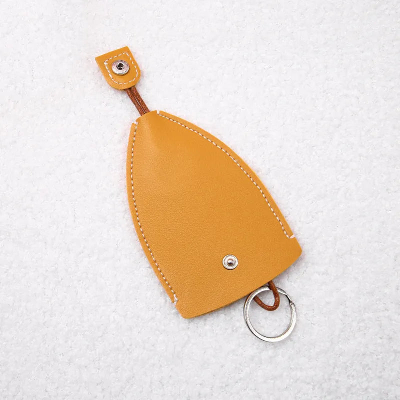 Cartoon design pull-out key case for car keys in PU leather.