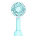 Blue handheld mini USB electric fan with three speed buttons and a shaking head.