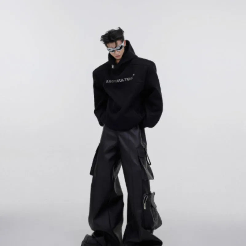 Men's red hooded sweater with heavy shoulder pads and raised silver metal 3D printing on the front.
