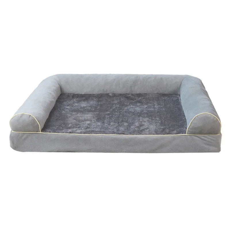 Square blue cloth dog bed with sponge filling, shown in a home setting.