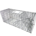 Fully automatic foldable cat trap cage galvanised steel 60x20x18cm with pedal mechanism on grass
