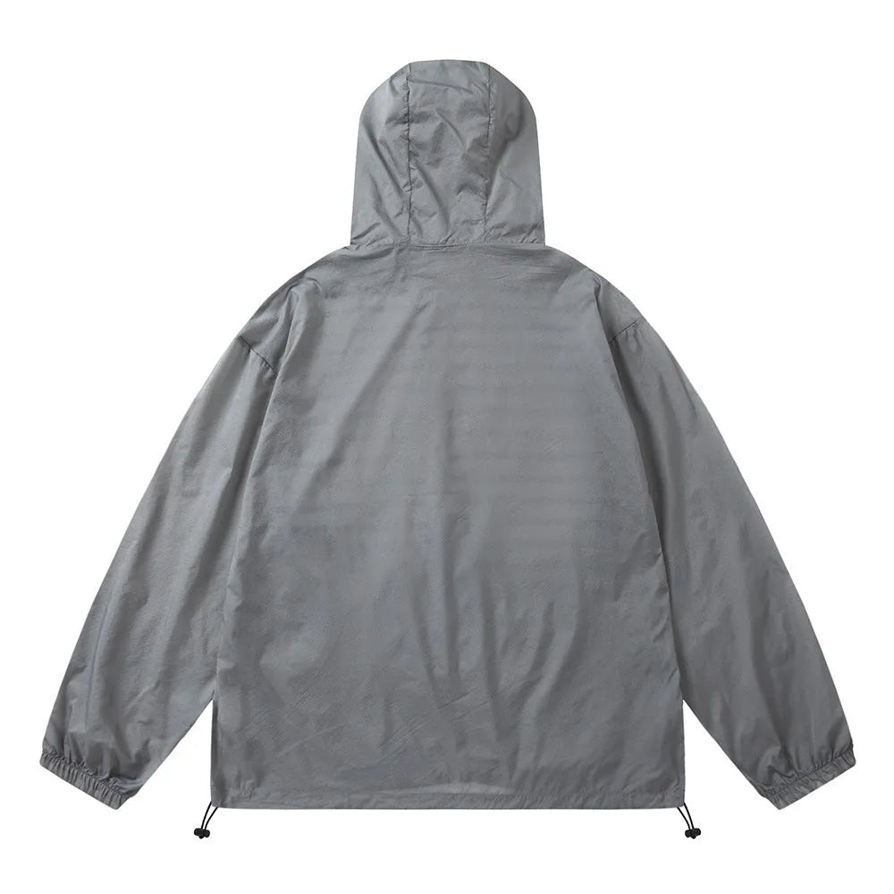 Men's nylon sun protection jacket with letters print in gray, shown on a model