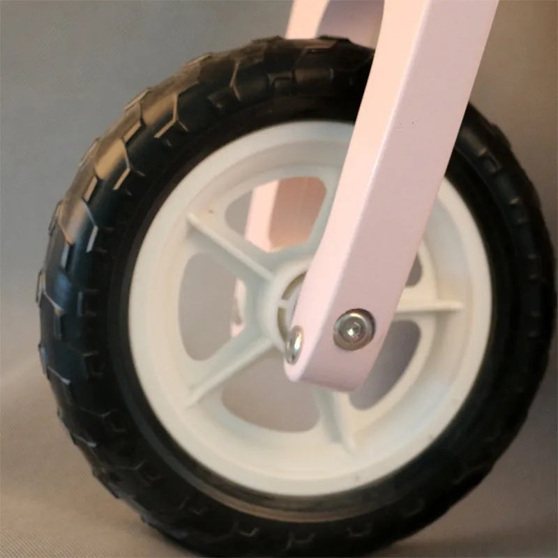 Pink wooden toddler balance scooter with 10-inch wheel for children aged 1-3 years.