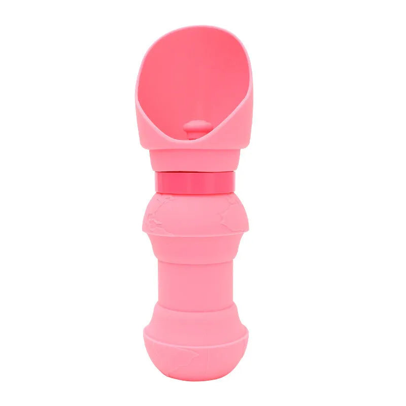 Silicone pet folding water cup shown in pink colour, unfolded ready to use.
