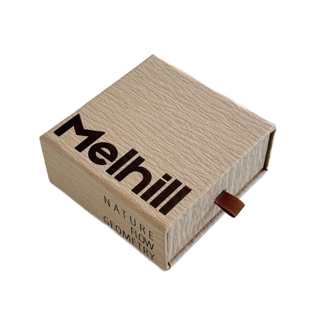 Beige brown cardboard drawer jewellery box with a storage bag beside it