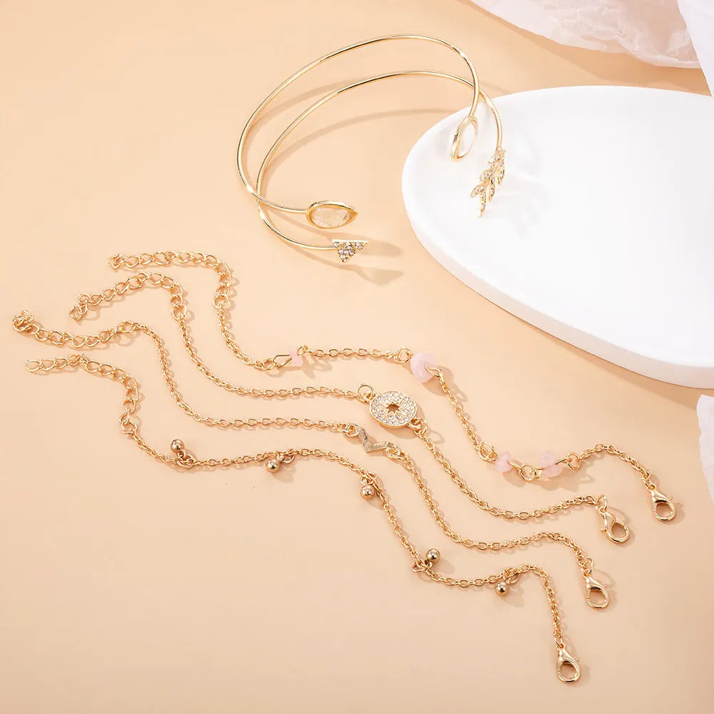Six-piece women's fashion bracelet set with golden spot drill and water droplet designs