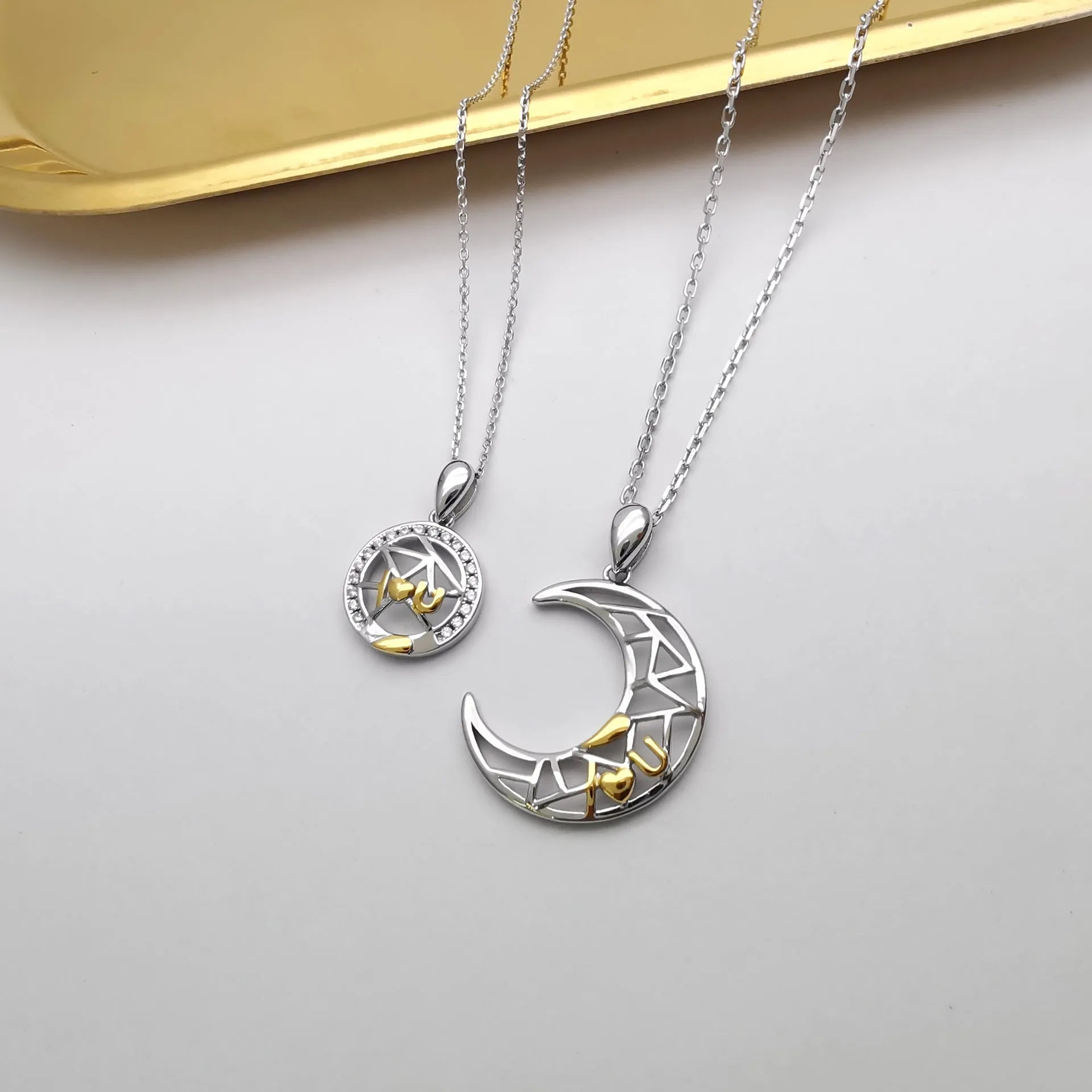 Sun and moon couple necklace with copper pendants on cross chain for matching jewellery