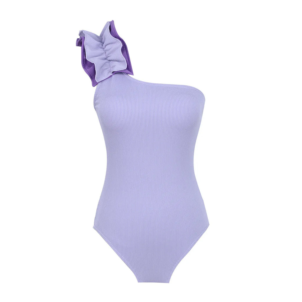 Women's single-shoulder suspender one-piece swimsuit in solid colour with high-waist design.